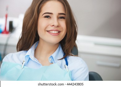 My Smile Is Perfect! Portrait Of Happy Patient In Dental Chair.