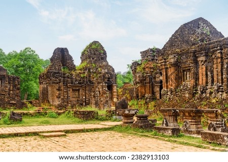 My Son Sanctuary among green woods in Da Nang (Danang), Vietnam. My Son is a complex of partially ruined ancient Hindu temples constructed by the kings of Champa.