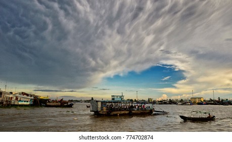 My Tho, Vietnam - 2012: Small Ferry Crossing Mekong River