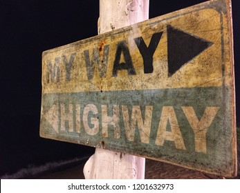 My Way And Highway Screen On Old Wood At The Beach In Night. Signposts Concept.