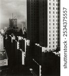 From My Window at the Shelton, West (1931) by Alfred Stieglitz. Black and white vintage art photography, vintage art print. Black and white photography of buildings from window at the Shelton, West.