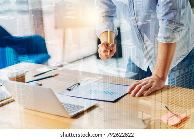 My workplace. Professional worker bowing head while making notes and being in the office - Shutterstock ID 792622822