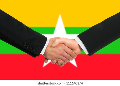 The Myanmar Flag And Business Handshake