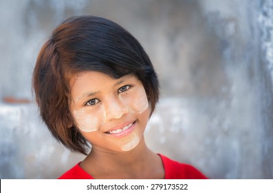 Myanmar Girl With Cosmetic Power On Her Face