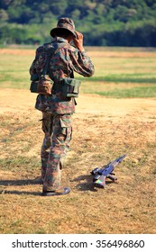 Myanmar Soldier Use Ear Plug Before Shooting