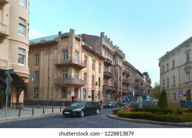 Mykhaila Hrushevskoho Square, Saksaganskogo Street, car road, old architecture, buildings and green bushes - Shutterstock ID 1228813879
