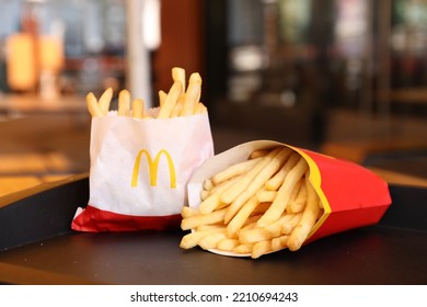 MYKOLAIV, UKRAINE - AUGUST 11, 2021: Big And Small Portions Of McDonald's French Fries On Tray In Cafe