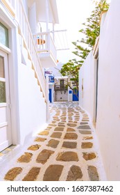 Mykonos, Greece Famous Island Street View With White And Blue Houses In Cyclades