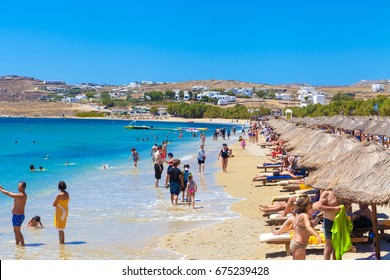 Mykonos (Greece) July 2017. Tourists at Kalafatis Beach.