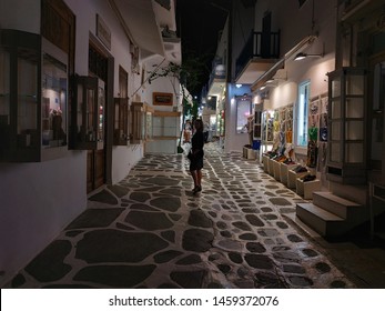 MYKONOS, GREECE - JULY 24, 2019: Mykonos Street View At The Night 