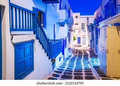 Mykonos, Greece. Night Illuminated Whitewashed Street In Beautiful Mykonos Town, Cyclades Greek Islands.