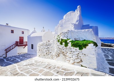 Mykonos, Greece. Whitewashed dotted alley in old city Little Venice, Cyclades Greek Islands.
