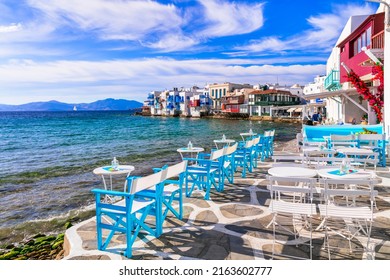 Mykonos island,Cyclades. Greece summer holidays. Bars by the sea in famous popular place 