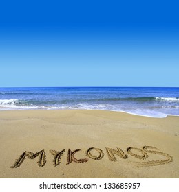 Mykonos Written On Sandy Beach