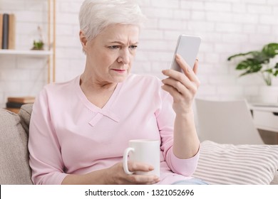 Myopia. Senior Woman Holding Phone Near Face, Trying To See Message, Free Space