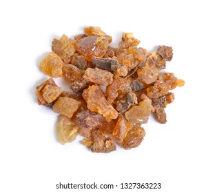 Myrrh is a natural gum or resin extracted from a number of small, thorny tree species of the genus Commiphora Isolated on white,