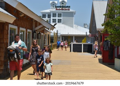 Myrtle Beach, SC - United States - 07-05-2021: Visitors Explore The Grounds Of Barefoot Landing On A Hot Day.