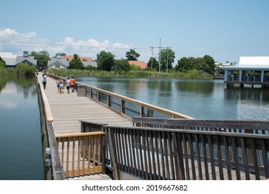 Myrtle Beach, SC - United States - 07-05-2021: Visitors Explore The Grounds Of Barefoot Landing On A Hot Day.