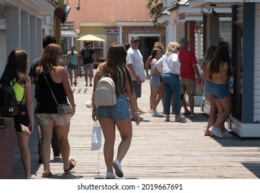 Myrtle Beach, SC - United States - 07-05-2021: Visitors Explore The Grounds Of Barefoot Landing On A Hot Day.