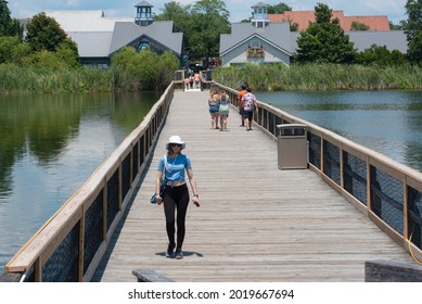 Myrtle Beach, SC - United States - 07-05-2021: Visitors Explore The Grounds Of Barefoot Landing On A Hot Day.