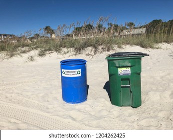 Myrtle Beach, SC / USA - August 29, 2018: Local & Visitors To The Grand Strand Are Encouraged To Keep The Beaches Clean By Throwing Away Their Trash And Recycling Their Plastic And Aluminum Goods.