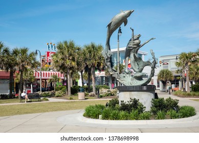 Myrtle Beach, SC/United States- 04/16/2019: The Boardwalk Is Seen Here With A Public Art Sculpture Entitled 