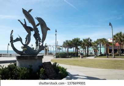 Myrtle Beach, SC/United States- 04/16/2019: The Boardwalk Is Seen Here With A Public Art Sculpture Entitled 