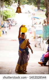 Mysore, India - June 27, 2018: Woman Carrying A Bowl Of Water On Her Head