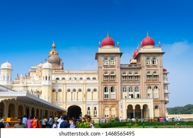 Mysore, Karnataka, India - November 25th,2018 : A Group Of Tourists Visiting Mysore Palace, A Historical Palace And A Royal Residence Of The Wadiyar Dynasty Of Mysore.