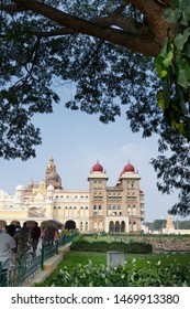 Mysore, Karnataka, India - November 25th,2018 : A Group Of Tourists Visiting Mysore Palace, A Historical Palace And A Royal Residence Of The Wadiyar Dynasty Of Mysore.