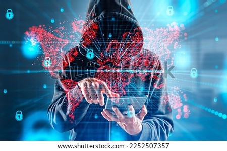 Mysterious businessman in casual wear typing on tablet device watching at digital interface with red map hologram, padlock in background. Concept of cybersecurity, data protection, cyberattack