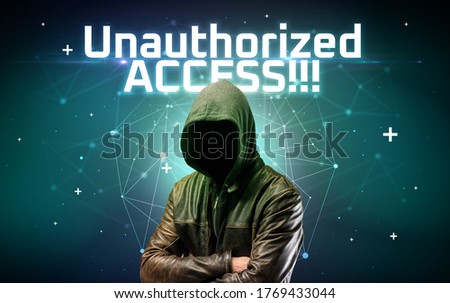 Mysterious hacker with Unauthorized ACCESS!!! inscription, online attack concept inscription, online security concept