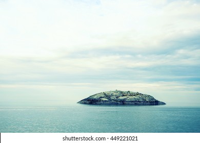 Mysterious Island In The Fog On Water