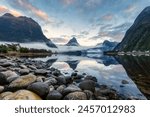 Mysterious landscape of Milford Sound or Rahotu with Mitre peak and foggy on the lake at Fjordland national park, New Zealand