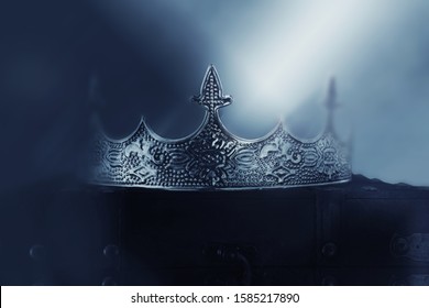 mysterious and magical photo of of beautiful queen/king crown over gothic snowy dark background. Medieval period concept - Shutterstock ID 1585217890