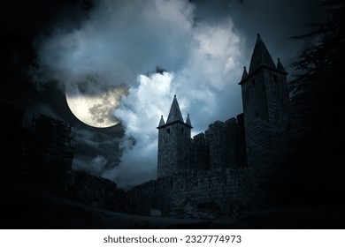 Mysterious medieval castle in a full moon night - Powered by Shutterstock