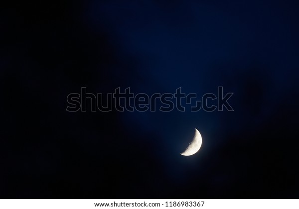 Mystery crescent moon with\
the dark