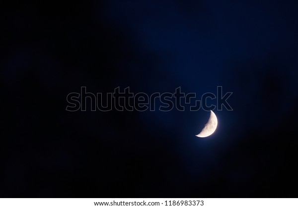 Mystery crescent moon with\
the dark