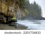 The Mystic Beach with a waterfall along the Juan de Fuca Trail,British Columbia, Canada