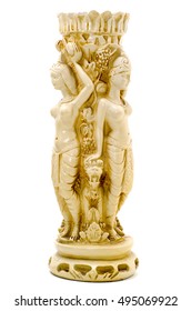Mystic Candle in the form of female figures with Cerberus at the feet. Carved ivory. Isolated image.