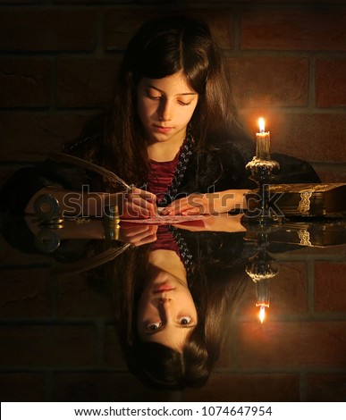 Mystic image with girl writing letter 