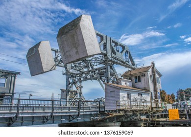 Mystic USA 2011-08-08  Iconic Mystic River Bascule Drawbridge With All Its Mechanical Parts Are Exposed Against A Beautiful Blue Sky With Clouds