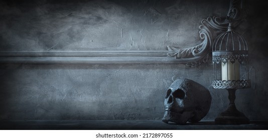 Mystical Halloween still-life background. Skull, candlestick with candles, old fireplace. Horror and witchery. - Shutterstock ID 2172897055