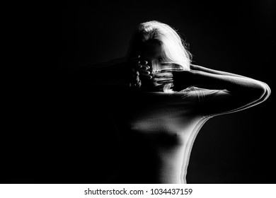 Mystical Intriguing Black And White Portrait Of A Young Girl. Drama And Tension Emotions