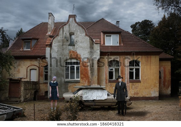 Mystical picture of\
an old house with corrupted frame of old car and strange persons\
against moody dramatic\
sky\
