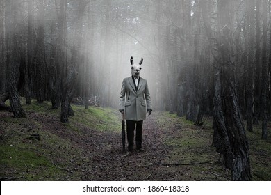 Mystical picture of a strange creature with a human body and a guanaco head in a mysterious forest covered with fog - Shutterstock ID 1860418318