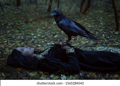 A Mystical Raven Is Sitting On A Dead Woman.