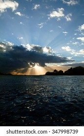 Mystical sunrays, sun through the clouds