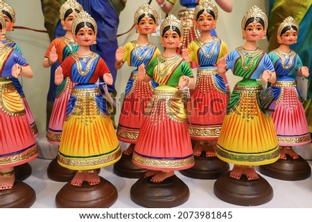 

Mysuru, Karnataka, India-October 27 2020; A Collection of charming Dancing girl Dolls made from clay and hand painted with vibrant bright colors in India.
