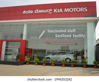 Mysuru,Karnataka,India-June 22 2021; A Front Elevation Of The KIA Car Showroom Closed Due To The Covid 19 Pandemic And A Social Message On The Glass Exterior To Attract Customers In Mysore, India.